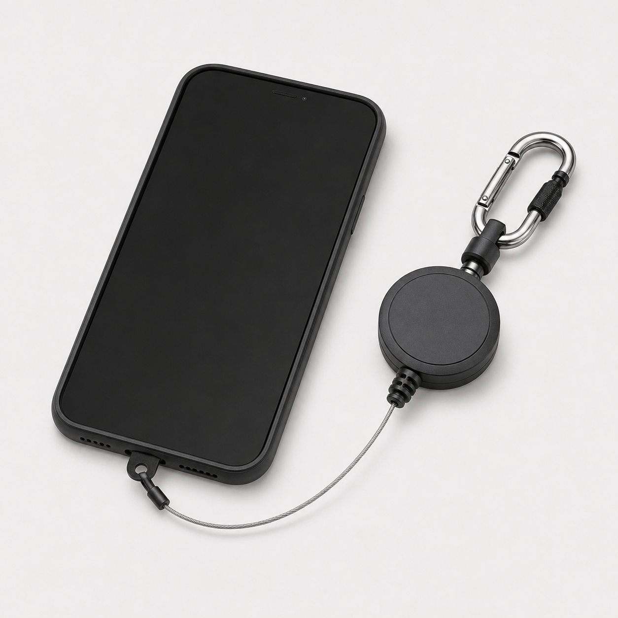 Retractable Anti-Theft Phone Tether installed correctly on a phone case